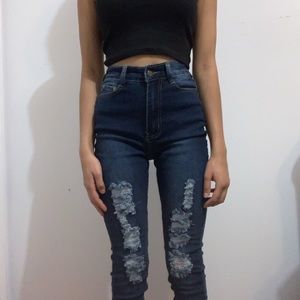 These are dark blue distressed fashion Nova jeans